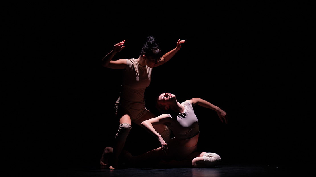 Two Webster Dance students perform "An External Experience" at the 2024 BFA Choreographic Concert. 