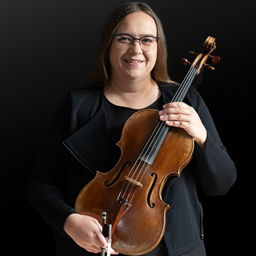 Ingrid Popp in black holding viola