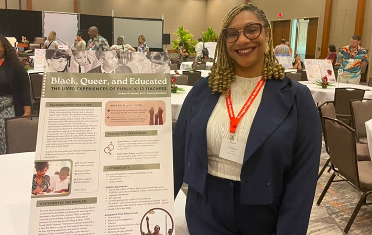 Andrea Jackson with her poster entitled Black, Queer and Education: The lived experience of public K-12 teachers