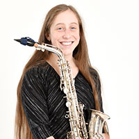 Hannah Wolkowitz with saxophone