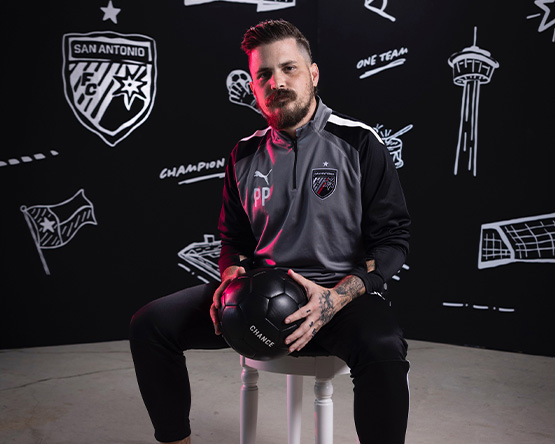 Preston Petri poses with a soccer ball for San Antonio FC