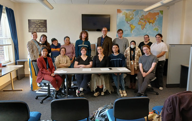 Students and faculty pose for a photo at the end of the Testimonies conference. 