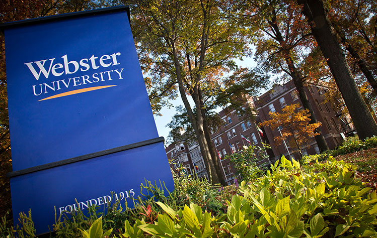 Webster University sign outside of Webster Hall.