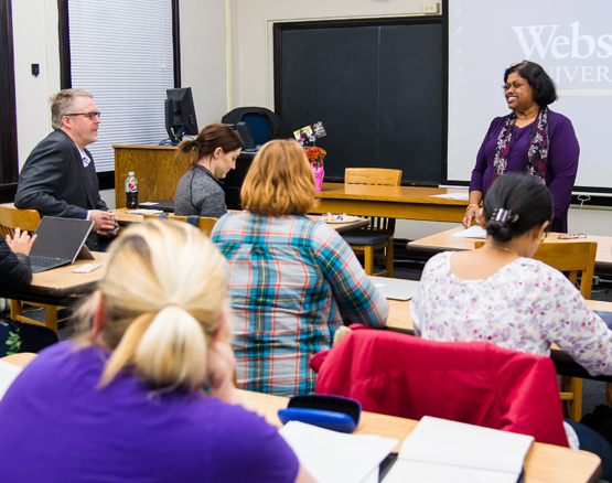 Classroom of students has lively discussion